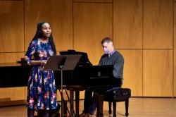 Vocalist Imani Achokah performs at the December Cali showcase, accompanied by collaborative pianist Michael Caldwell.