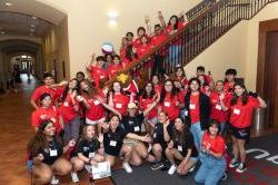 Photo of HSCI participants and peer mentors with Rocky the Red Hawk, the university mascot of Montclair State University