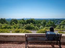 Photo of a student looking at the skyline